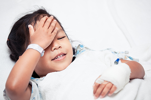 Krankes Kind im Bett