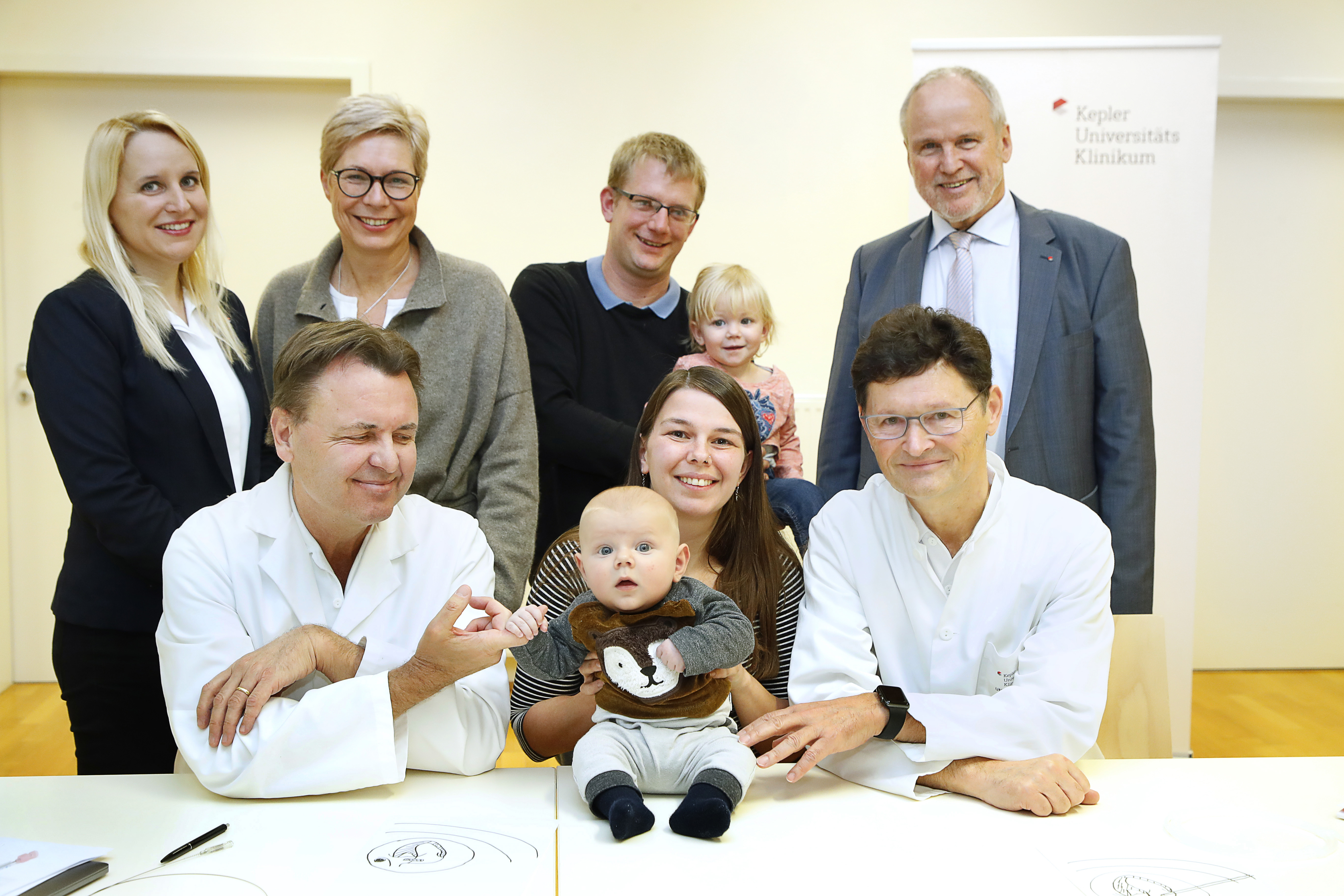 Arzte mit glücklicher Familie